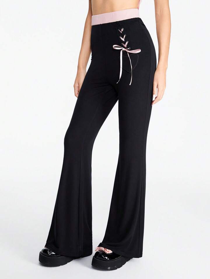 Grunge Punk Contrast Color Eyelet Bow Heart Patch Skinny Flare Pants For Women