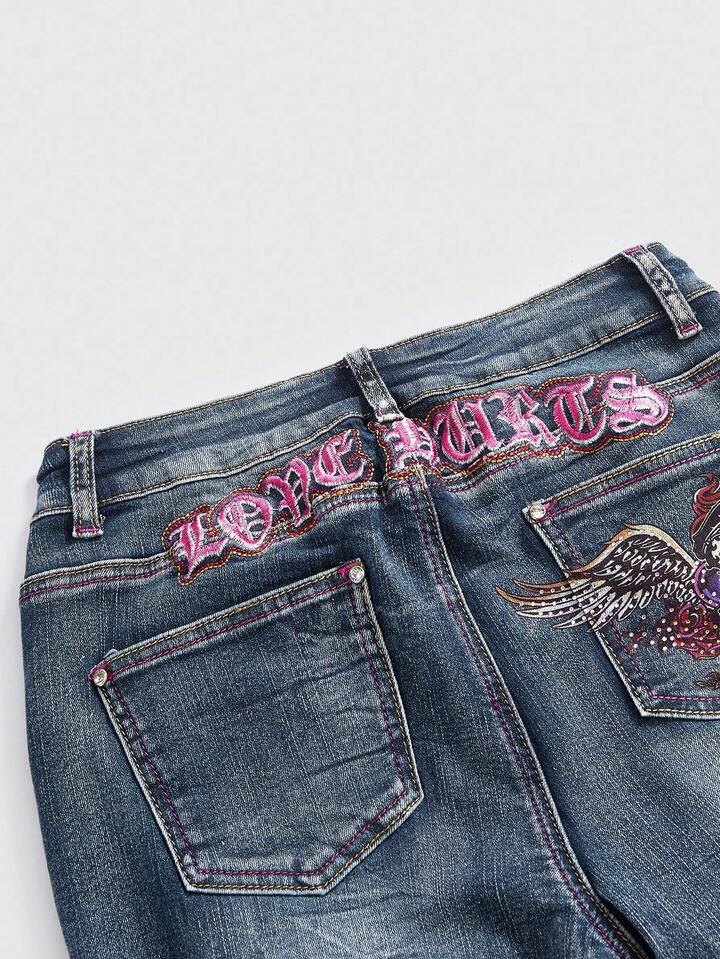 Betty Boop | ROMWE Y2K Biker Chic Rhinestone Wing Cartoon Figure Graphic Distressed Flare Leg Denim Low Waist Jeans 3 Betty Boop | ROMWE Plus Size Rhinestone Wing Embroidery Flared Jeans