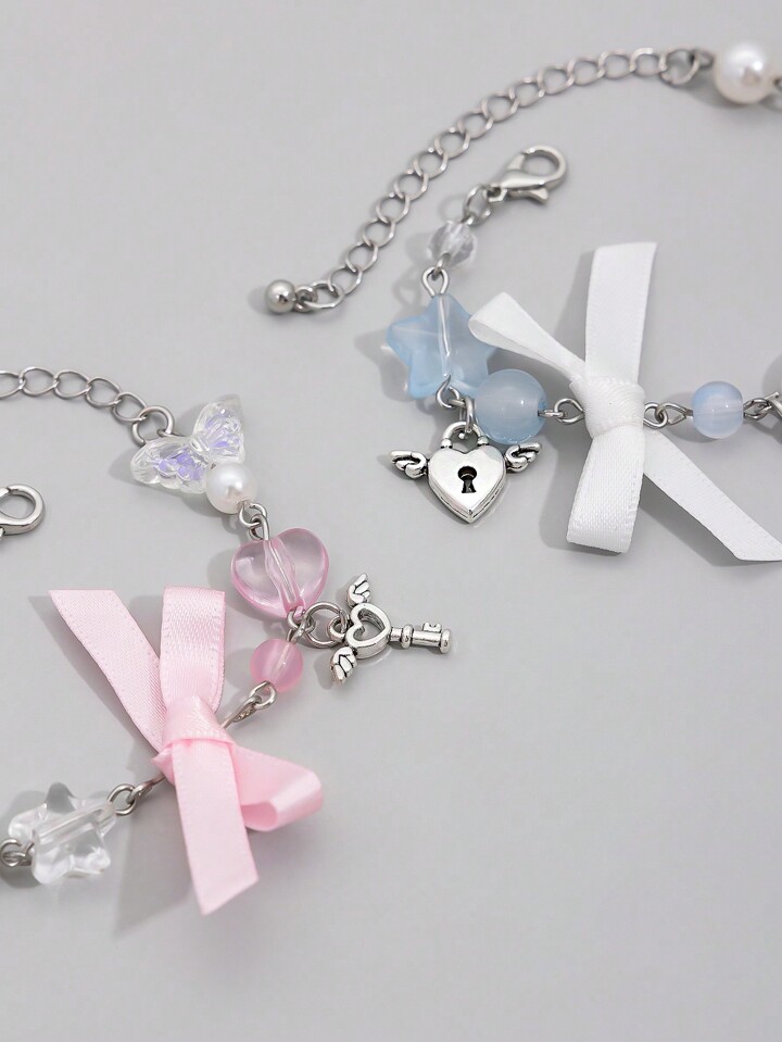 Kawaii 2pcs Fashionable & Cute Star Shaped Pearl & Crystal Decor Keychain & Bracelet Set, Gift For Friends & Couples 2 Kawaii 2pcs Fashionable & Cute Star Shaped Pearl & Crystal Decor Keychain & Bracelet Set, Gift For Friends & Couples