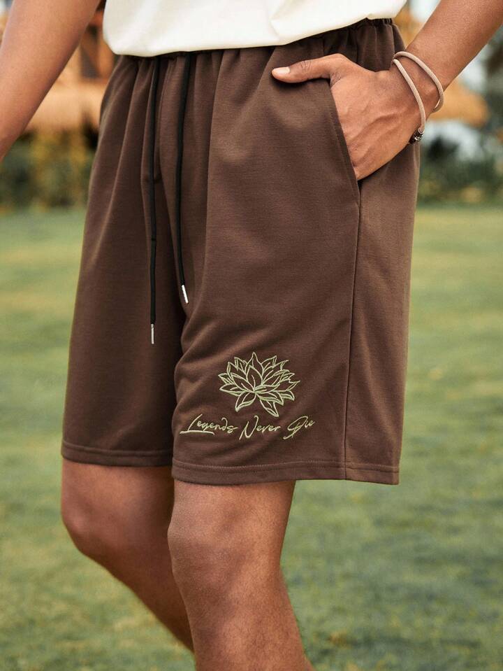 The White Lotus Men's Summer Casual Lotus Flower & Letter Graphic Drawstring Waist Diagonal Pocket Loose Shorts